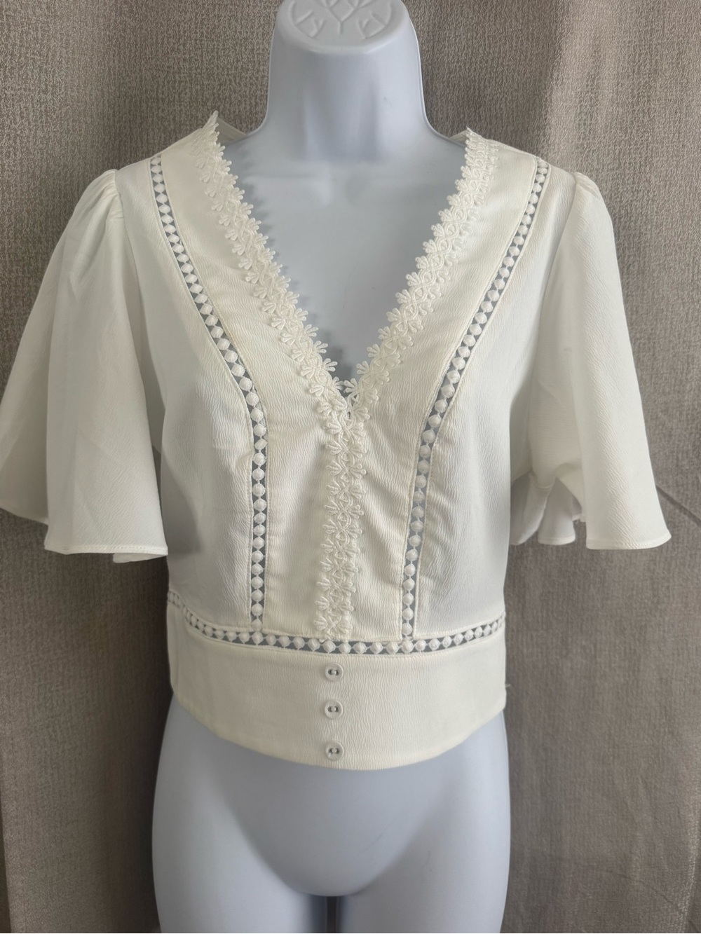 White Embroidered V-Neck Women’s Top